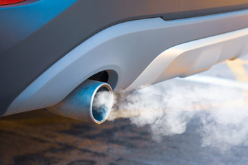 Waste smoke, the crisis of urban air pollution from car diesel exhaust on the road. Concept:...
