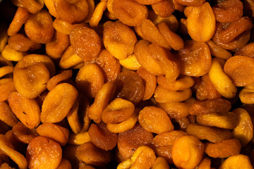 Dried apricots. Macro. Heap of dried apricots close-up.