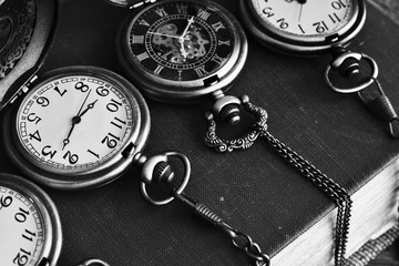 Four Vintage Pocket Watches and Antique Book