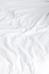 crumpled white sheets