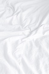 crumpled white sheets