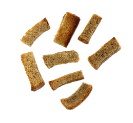 Croutons isolated. Dried bread, crust. Bread crumbs isolated. Bread dentil on a white background.