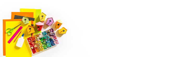 Birdhouse made of paper. anner Copy space