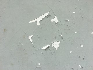 Concrete walls with peeling color, texture
