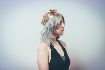 Naklejka premium Young woman and a princess, crown on his head