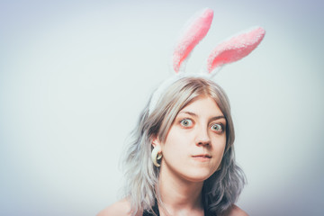 Portrait of girl with white rabbit ears