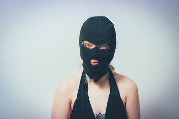 woman wearing balaclava or mask on head