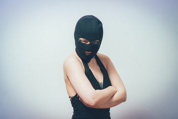woman wearing balaclava or mask on head