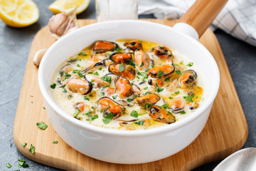 Garlic mussels in sour cream sauce. Pasta or spaghetti sauce.