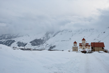 small cathedral Georgia country side in winter season at Gudauri