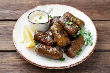 Dolma - stuffed grape leaves with rice and meat. Traditional Turkish and Greek dish	