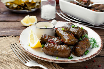 Dolma - stuffed grape leaves with rice and meat. Traditional Turkish and Greek dish	