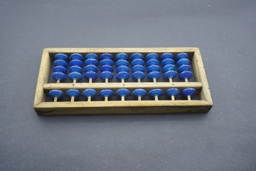 Naklejka premium traditional counting tool called abacus (sempoa)
