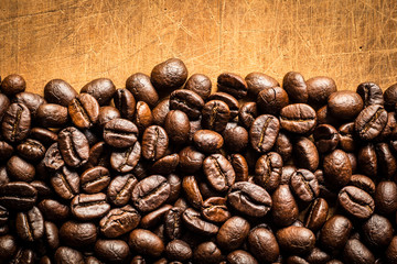 coffee beans on wooden background