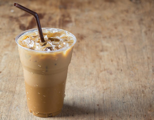ice coffee on wooden table