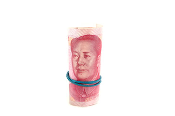 Chinese yuan rolled up isolated on a white background.