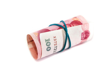 Chinese yuan rolled up isolated on a white background.