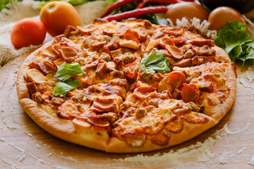 Pizza on rustic grey background, top view. Pizza with minched meat, celery and Mozzarella Cheese...