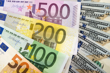Euro and dollars close up. delicate background.