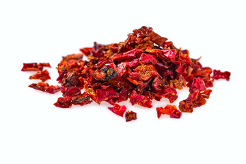 Macro photo with shallow dipth of field of dried chili isolated on white background