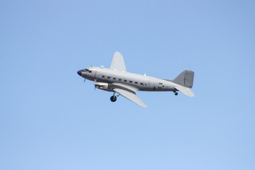 Fototapeta na wymiar Vintage airplane in the sky