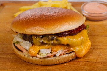 Burger with beef, cheese and iceberg salad