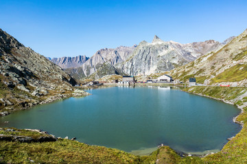 Obraz na płótnie Canvas view of the Great St. Bernard Pass with lake. Connects Martigny in the Canton of Valais in Switzerland with Aosta Valley Region of Italy
