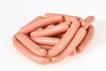 Tasty meat sausages over white background