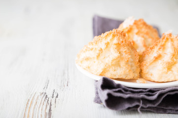 Homemade coconut cookies on a white table