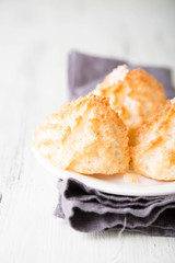 Homemade coconut cookies on a white table