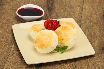 Curd pancakes with jam and stravberry