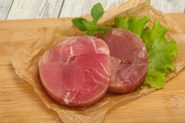 Raw tuna round steak for grill