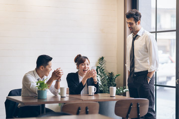 Asian business coworkers discussion in modern office working design planning