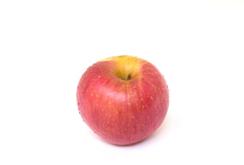 Fototapeta na wymiar Fresh and organic Fuji Apple isolated on white background