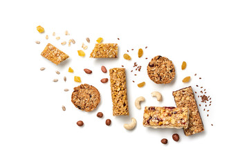Granola bar with nuts and dry fruit berries flying. Energy cereal snack fall. Fitness diet food....