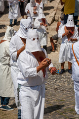 hooded men (battenti) beat their chest with a sponge with a nail, losing blood during septennial rites of penance, rituals in honor of Our Lady in Guardia Sanframondi, Benevento, Italy