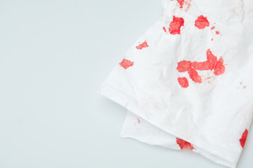 blood stains on a white paper