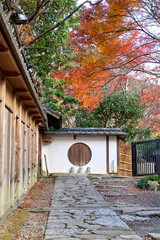 Old stone path to the building with circle window