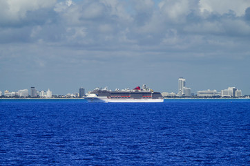 Cruiseships or cruise ship liners parked or anchored or laid up at sea in Miami Beach Florida due...
