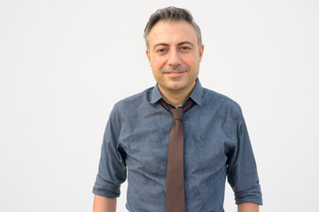 Fototapeta premium Portrait of happy mature handsome businessman smiling