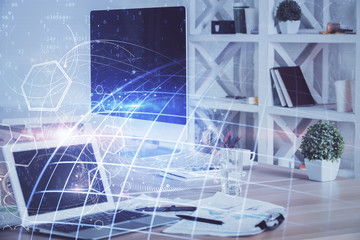 Multi exposure of table with computer and world map hologram. International data network concept.