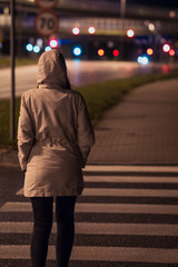 girl walking at night in the city
