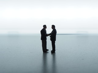 The moment a contract is signed and a businessman shakes hands