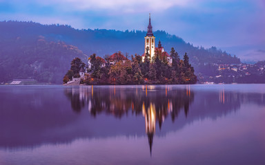 Fototapeta na wymiar Europe Slovenia Lake Bled island. Pilgrimage Church of the Assumption of Maria
