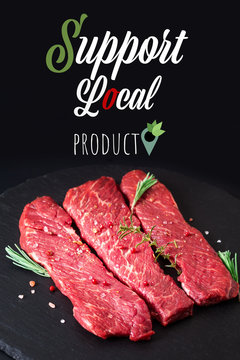 Crisis campaign Support Local farmer product organic raw meat filet beef steak on black slate stone background
