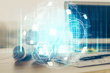 Computer on desktop with social network theme icon. Multi exposure. Concept of international connections.