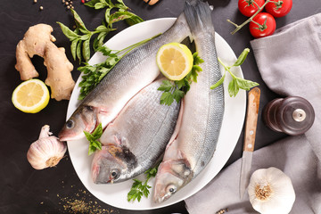 raw fish with ginger, garlic and herb