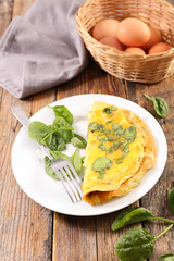 omelet with spinach on plate