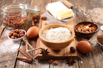 Fototapeta na wymiar baking food ingredient with flour, egg, butter and nuts