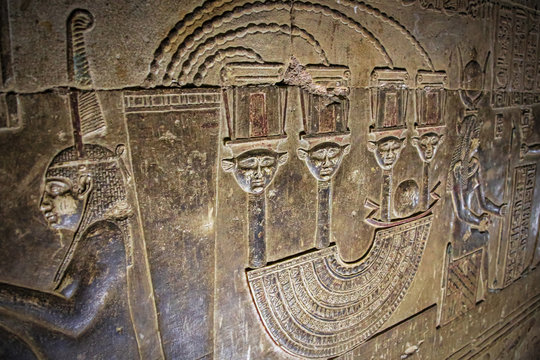 Mysterious murals on the walls of the Temple of Dendera Hathor , near the city of Ken